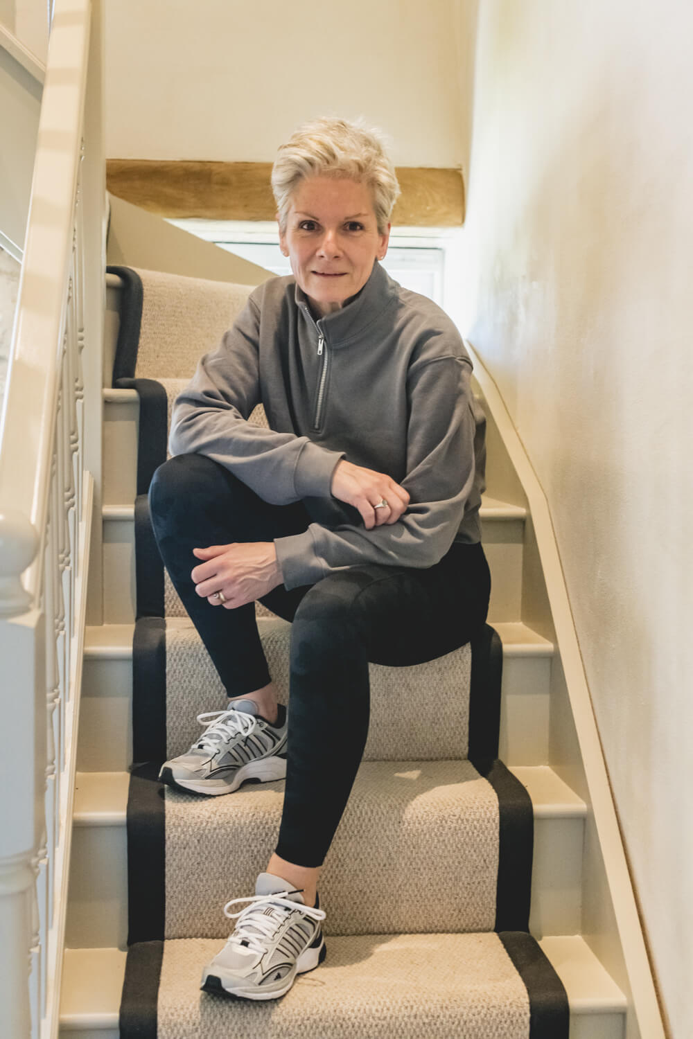 Rosie Jackson sitting on the stairs